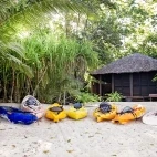 Kayaks on the beach at Barrier Beach Resort, which are available to hire during your stay.