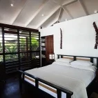 Beachfront fare bedrooms at Barrier Beach Resort, Vanuatu.