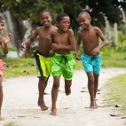 Boys running in Fiji.