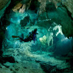 Diver & cave in Palau.