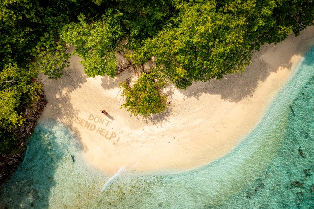 Aerial of the beach at Papua Paradise Resort in Raja Ampat, Indonesia.