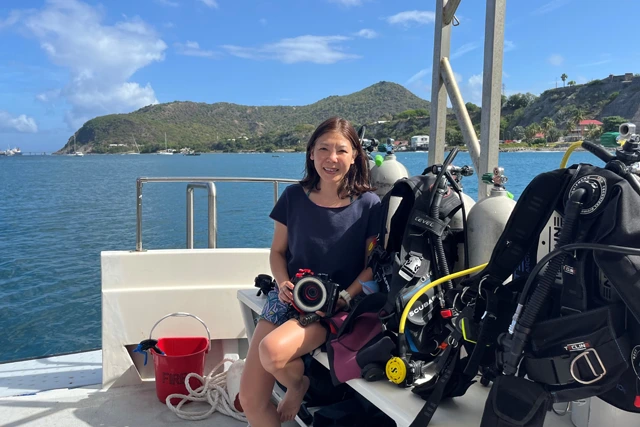 Jobi on a dive boat in St Eustatius, Caribbean.