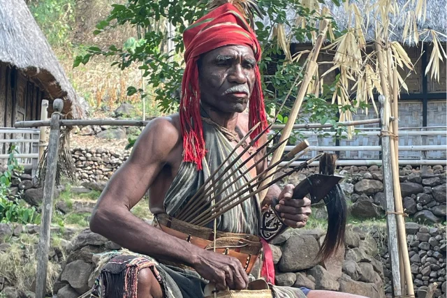 Local man with arrows, in Alor, Indonesia.