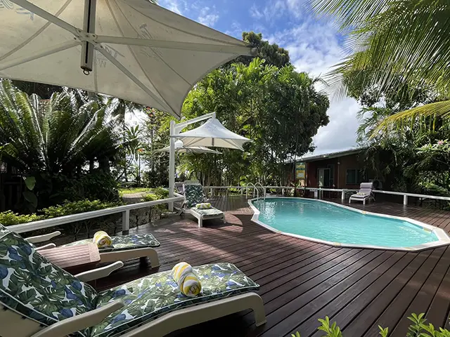 The swimming pool and sun loungers at Tufi Dive Resort in Papua New Guinea